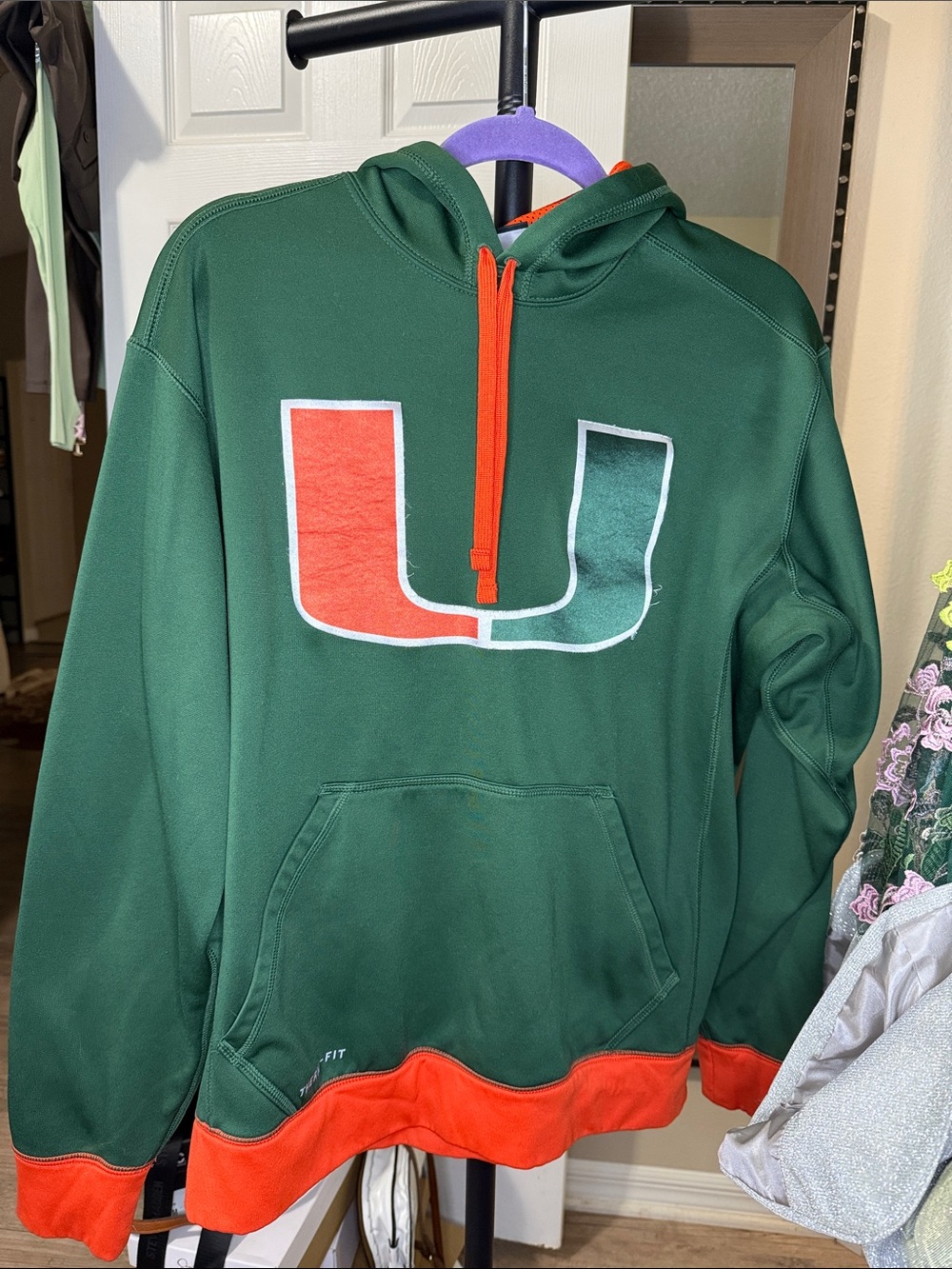 Nike Green Hooded Sweatshirt with Orange Accents and U Logo